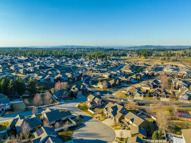 aerial view of property's location featuring nearby suburban area