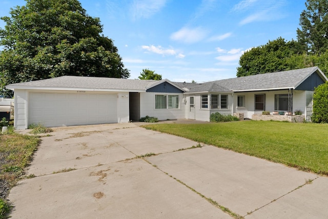 16813 E Valleyway Ave, Spokane Valley, WA 99037 - single story home with a garage, driveway, a front yard, and a shingled roof