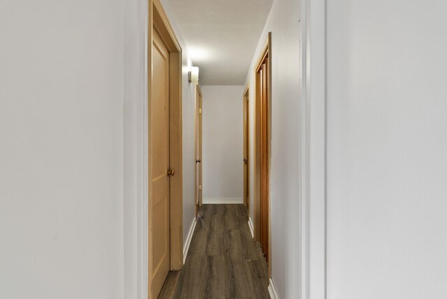 16813 E Valleyway Ave, Spokane Valley, WA 99037 - corridor featuring dark wood-style flooring and baseboards
