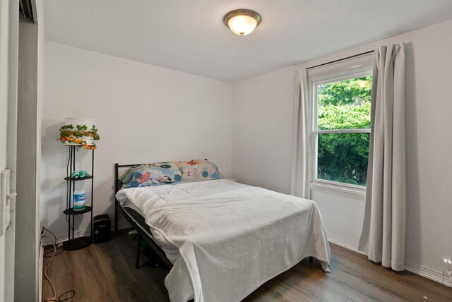16813 E Valleyway Ave, Spokane Valley, WA 99037 - bedroom with dark wood finished floors and baseboards