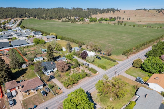 aerial view of property's location with nearby suburban area