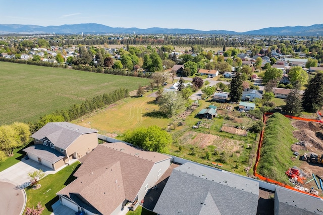 aerial view of residential area with a mountain backdrop
