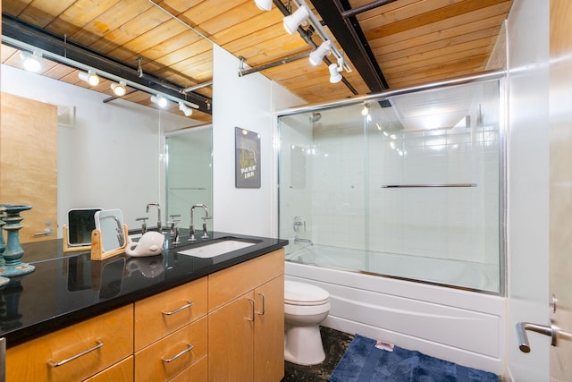 1016 W Railroad Ave Unit 202, Spokane, WA 99201 - bathroom with track lighting, wood ceiling, toilet, vanity, and beam ceiling