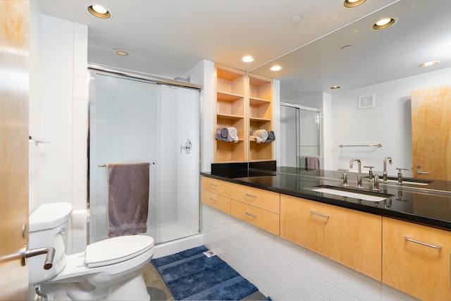 1016 W Railroad Ave Unit 202, Spokane, WA 99201 - bathroom featuring toilet, recessed lighting, a stall shower, vanity, and tile patterned floors