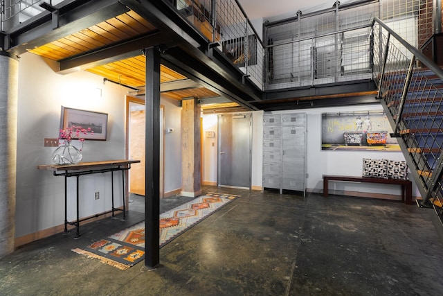 1016 W Railroad Ave Unit 202, Spokane, WA 99201 - below grade area featuring baseboards and stairway