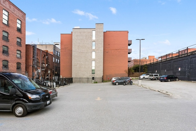 1016 W Railroad Ave Unit 202, Spokane, WA 99201 - view of building exterior with uncovered parking