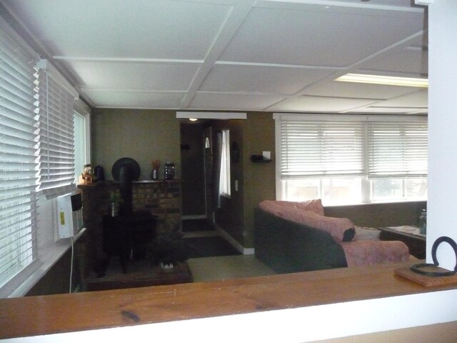 living room with a wood stove