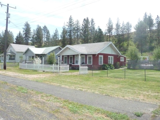 ranch-style home featuring covered porch