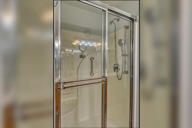 full bathroom featuring a stall shower