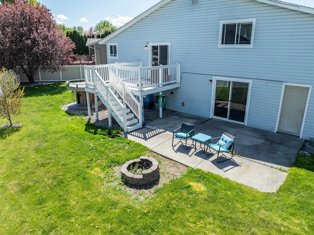 5212 N Bellevue Ct, Spokane Valley, WA 99216 - back of house featuring an outdoor fire pit, a wooden deck, a patio area, and stairs