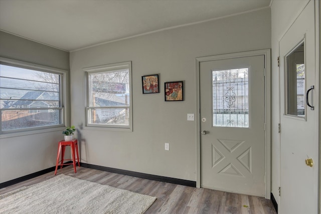 1121 W Knox Ave, Spokane, WA 99205 - entryway featuring healthy amount of natural light, wood finished floors, and baseboards
