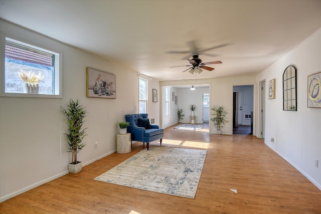 324 E Everett Ave, Spokane, WA 99207 - living area with ceiling fan, light wood-style flooring, and baseboards