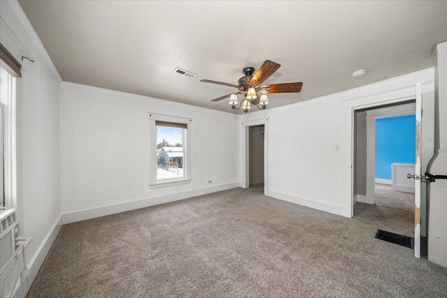 1207 E Wabash Ave, Spokane, WA 99207 - unfurnished bedroom with carpet flooring, baseboards, a ceiling fan, and a closet