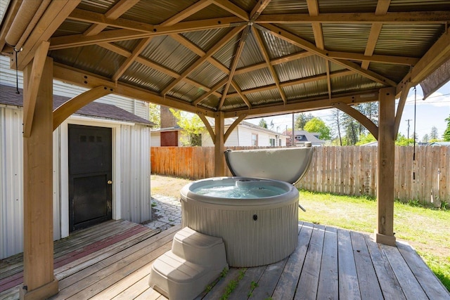 1207 E Wabash Ave, Spokane, WA 99207 - deck with a shed, a gazebo, a hot tub, and an outdoor structure
