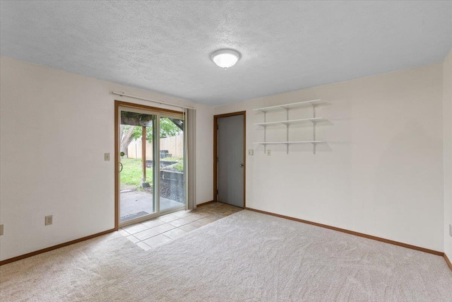 15121 N Meadowview Dr, Mead, WA 99021 - unfurnished room with baseboards, light colored carpet, and a textured ceiling