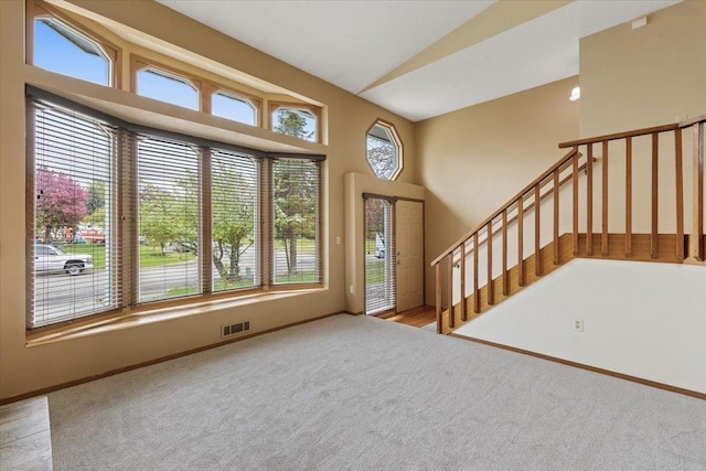 15121 N Meadowview Dr, Mead, WA 99021 - entryway with carpet floors, baseboards, stairs, and lofted ceiling