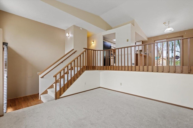15121 N Meadowview Dr, Mead, WA 99021 - stairs featuring carpet floors, lofted ceiling, and baseboards
