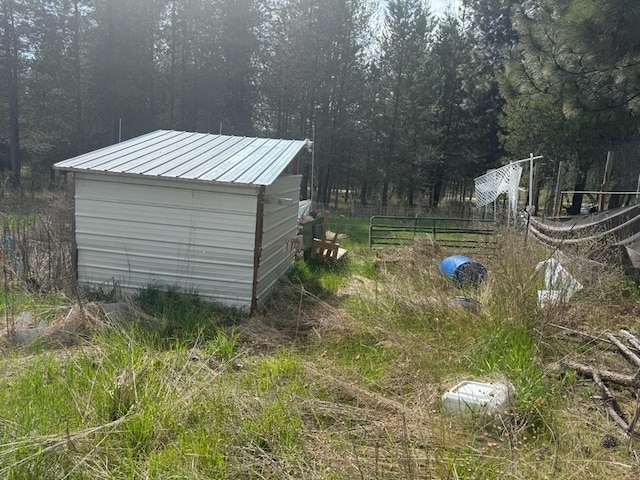 1468 Veit Rd, Newport, WA 99156 - view of yard featuring fence, an outbuilding, and a shed