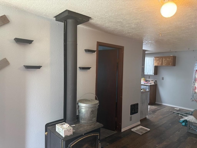 1468 Veit Rd, Newport, WA 99156 - hallway with a textured ceiling, dark wood-type flooring, and baseboards