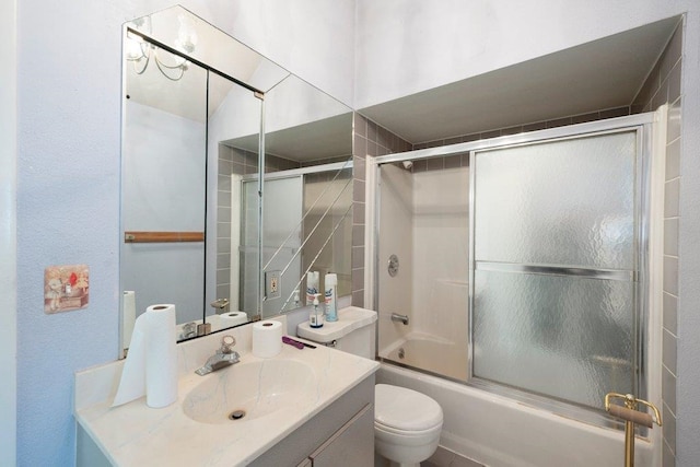 1725 N Park Rd, Spokane Valley, WA 99212 - full bath featuring toilet, vanity, and bath / shower combo with glass door