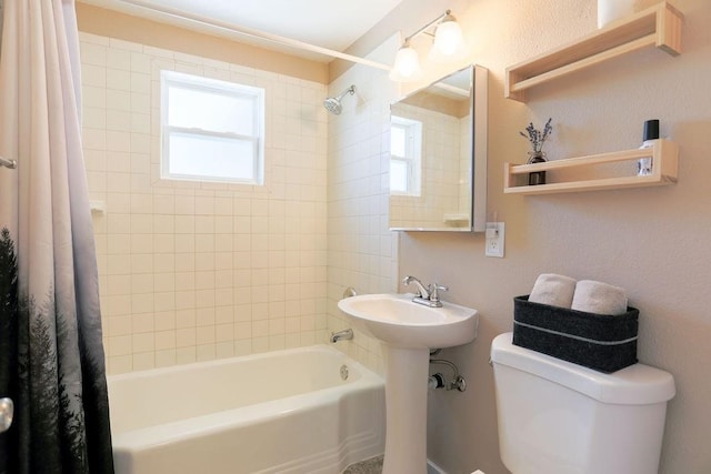 2804 W Crown Ave, Spokane, WA 99205 - bathroom featuring toilet, shower / bath combination with curtain, and a sink