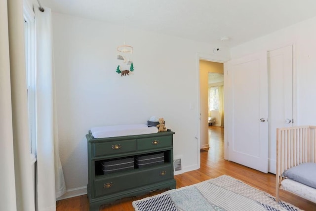 2804 W Crown Ave, Spokane, WA 99205 - bedroom featuring wood finished floors and baseboards