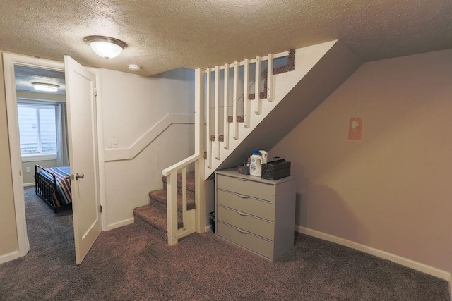2804 W Crown Ave, Spokane, WA 99205 - stairway with a textured ceiling, carpet, and baseboards