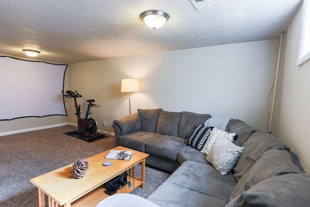2804 W Crown Ave, Spokane, WA 99205 - carpeted living area with a textured ceiling and baseboards