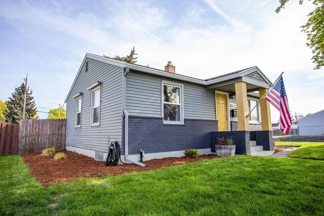 2804 W Crown Ave, Spokane, WA 99205 - view of side of property with a chimney and brick siding