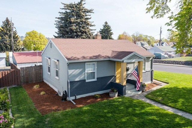 2804 W Crown Ave, Spokane, WA 99205 - bungalow-style home with a chimney, brick siding, and roof with shingles