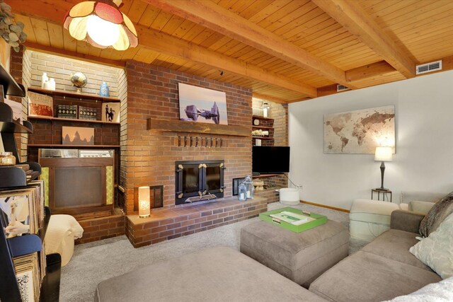living room featuring a fireplace, carpet, wooden ceiling, beamed ceiling, and baseboards