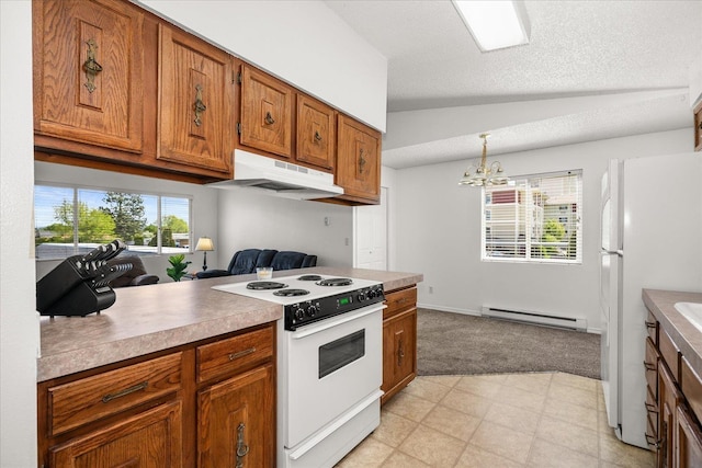 306 E Weile Ave Unit 3, Spokane, WA 99208 - kitchen with white appliances, a sink, lofted ceiling, baseboard heating, and brown cabinetry