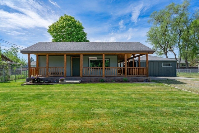 rear view of property with a porch and roof with shingles