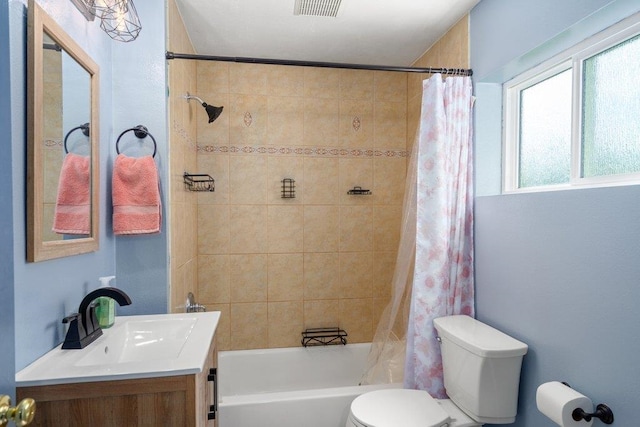 full bath featuring toilet, vanity, and shower / tub combo with curtain