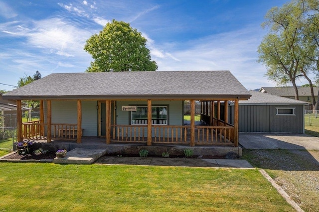 view of front of house with a porch and roof with shingles