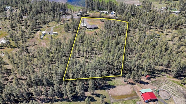 aerial overview of property's location with property parcel outlined