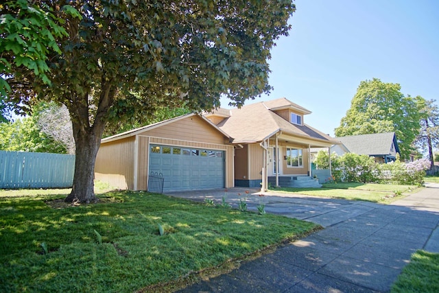 1018 E Broad Ave, Spokane, WA 99207 - view of front facade with a garage and driveway