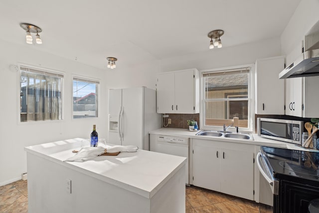 1018 E Broad Ave, Spokane, WA 99207 - kitchen with a sink, stainless steel microwave, white fridge with ice dispenser, range with electric stovetop, and light countertops