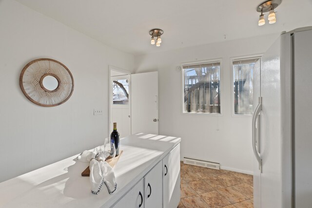 1018 E Broad Ave, Spokane, WA 99207 - bathroom featuring baseboard heating