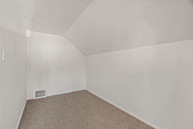 1018 E Broad Ave, Spokane, WA 99207 - bonus room featuring lofted ceiling, carpet floors, and baseboards