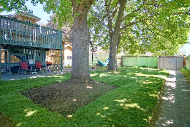 1018 E Broad Ave, Spokane, WA 99207 - view of yard with a storage shed, a patio area, an outbuilding, and a deck