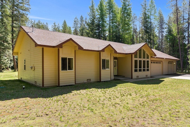 2238 Green Rd, Newport, WA 99156 - ranch-style house featuring a garage, concrete driveway, a front yard, a shingled roof, and crawl space