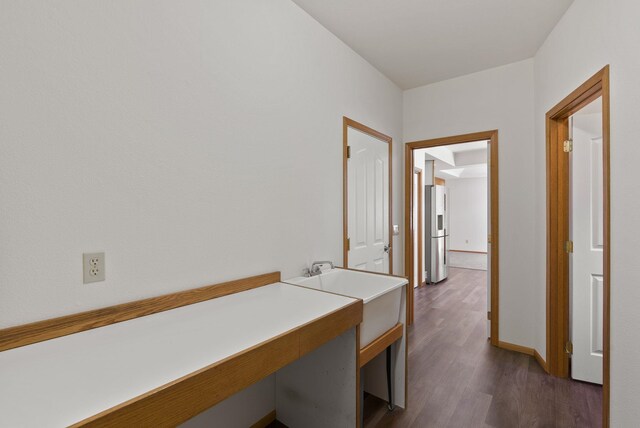 2238 Green Rd, Newport, WA 99156 - hall featuring dark wood-type flooring and baseboards