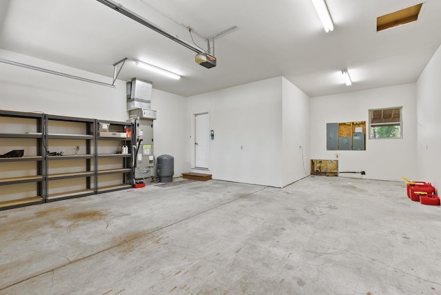 2238 Green Rd, Newport, WA 99156 - garage featuring a garage door opener and electric panel