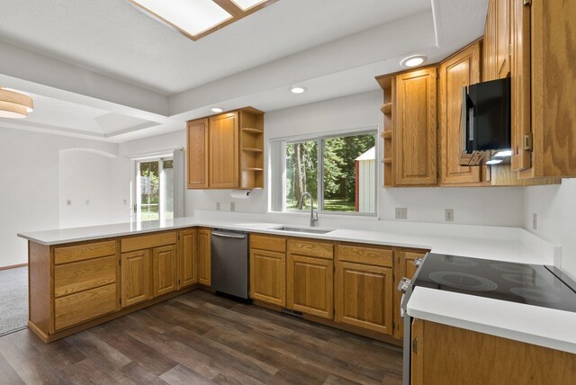 2238 Green Rd, Newport, WA 99156 - kitchen with open shelves, appliances with stainless steel finishes, a peninsula, a sink, and dark wood-type flooring