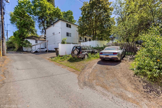 1114 W 7th Ave, Spokane, WA 99204 - view of front of house featuring fence and dirt driveway