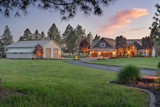 21621 N Lang Ln, Chattaroy, WA 99003 - yard at dusk featuring a lawn and driveway