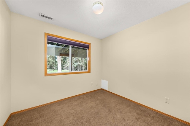 14512 N Dartford Dr, Spokane, WA 99208 - carpeted empty room featuring baseboards