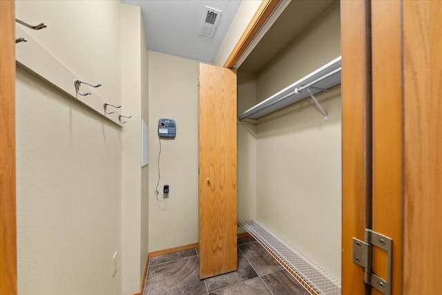 14512 N Dartford Dr, Spokane, WA 99208 - washroom featuring baseboards