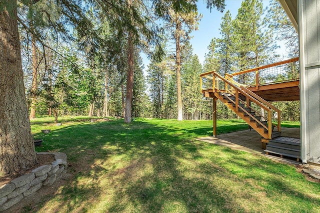14512 N Dartford Dr, Spokane, WA 99208 - view of grassy yard featuring stairs and a deck